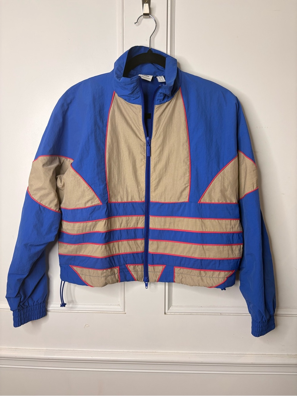 Adidas Blue and Beige Lightweight womens windbreaker.